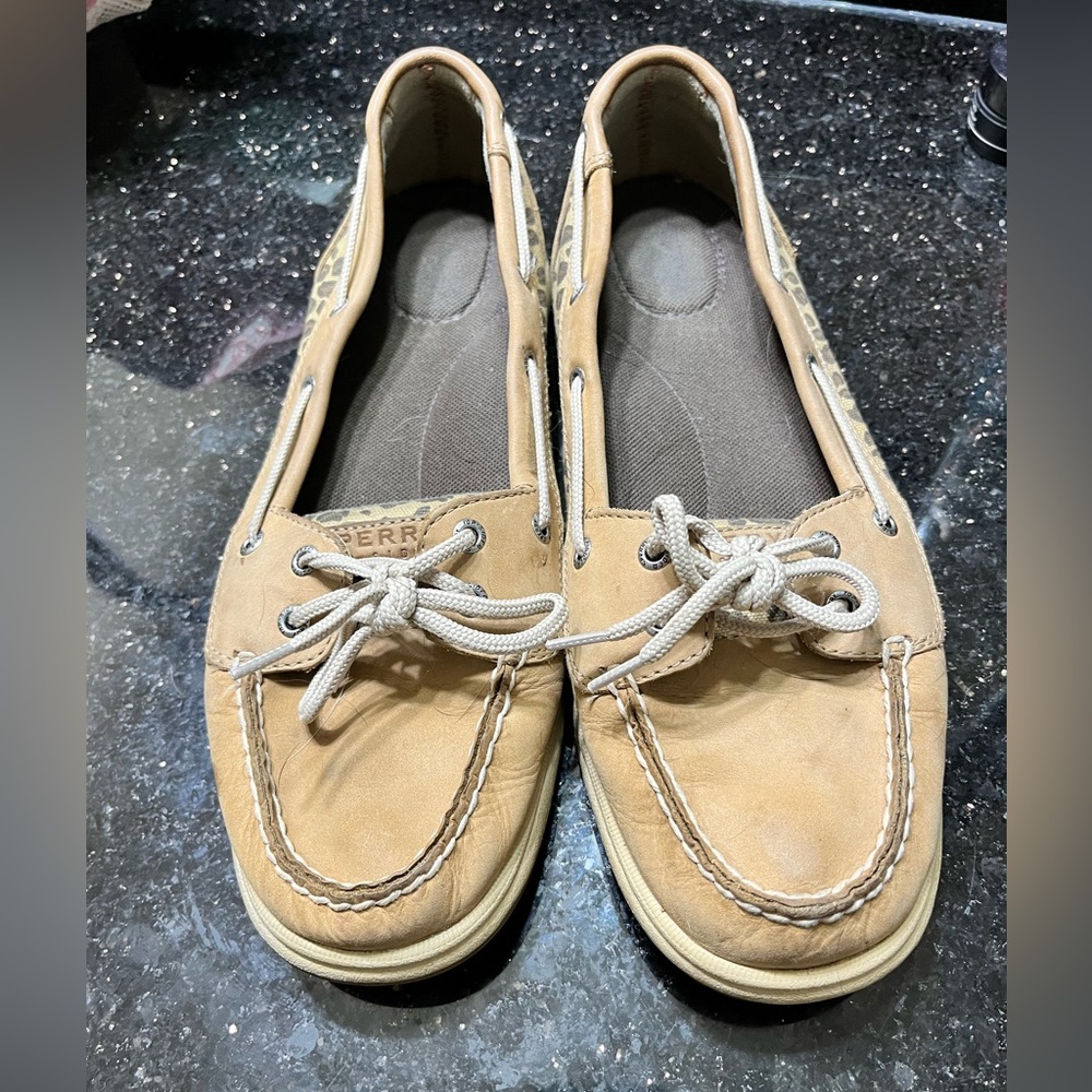 Sperry boat shoe with leopard print on the side
